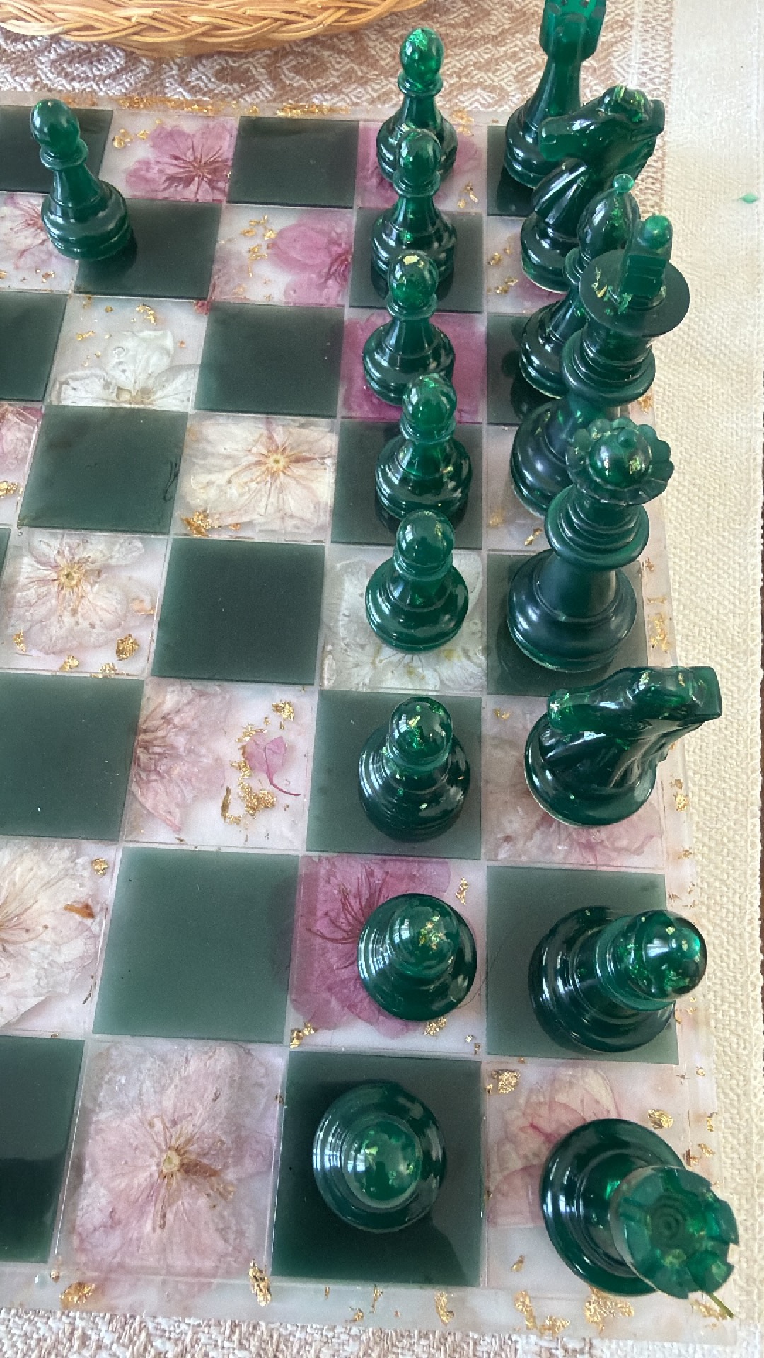 Emerald green resin chess pieces close-up