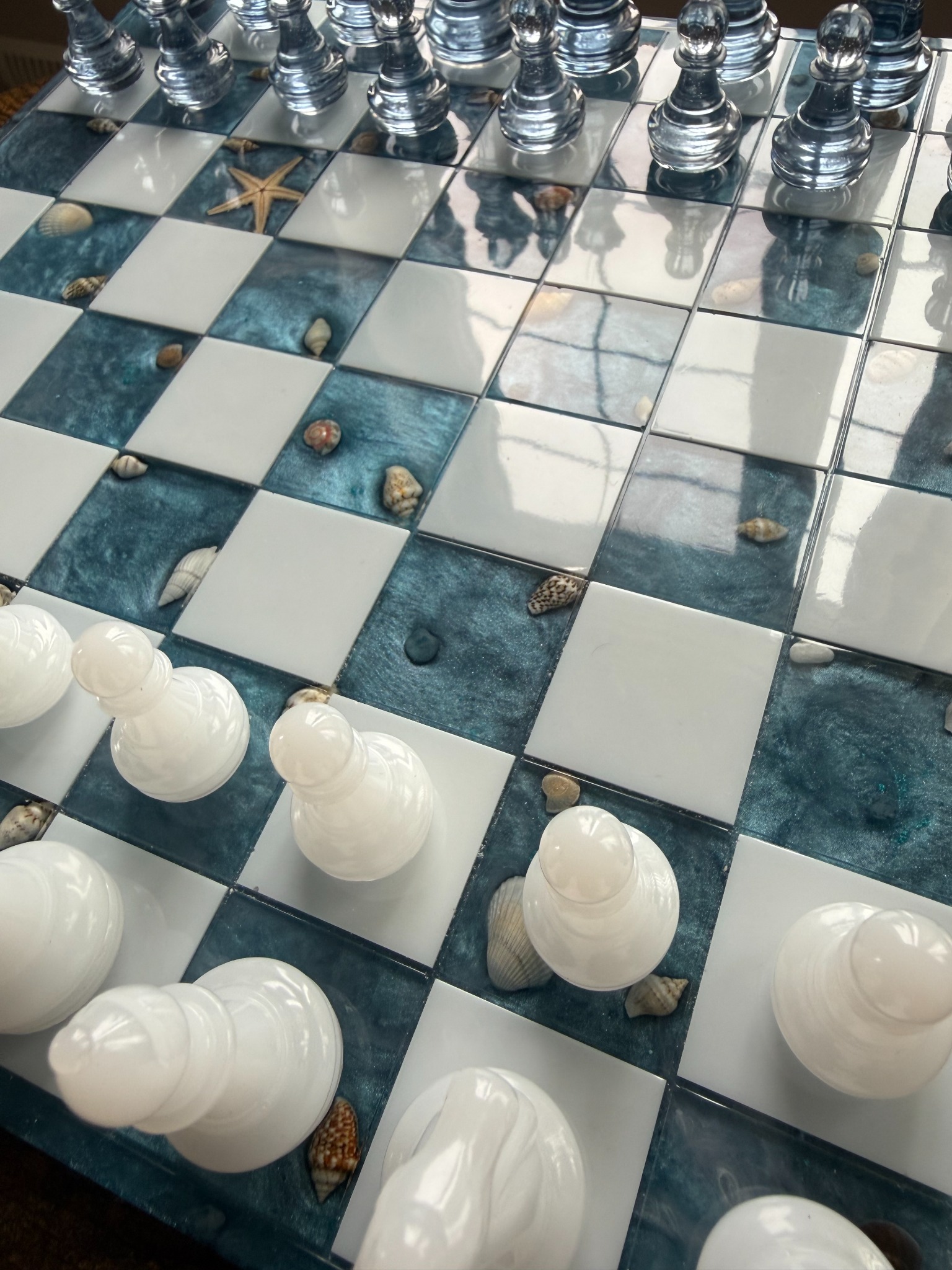 Ocean-themed resin chessboard close-up