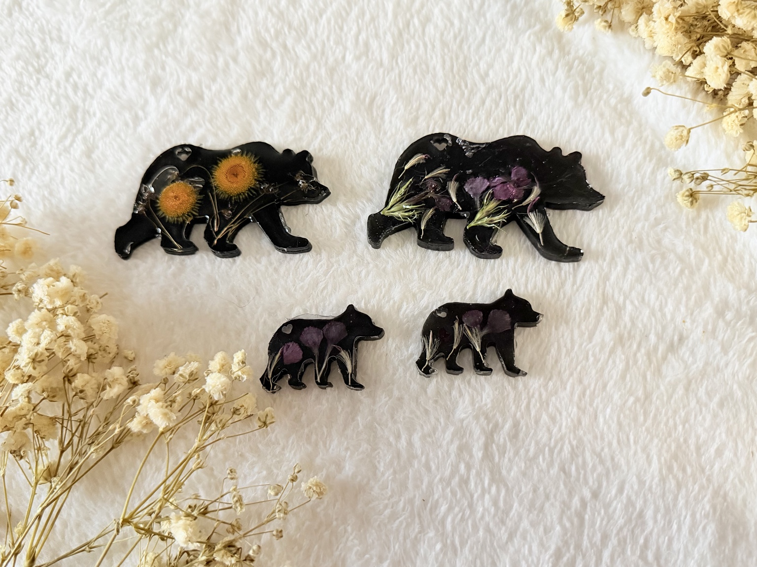 Black floral resin bear family