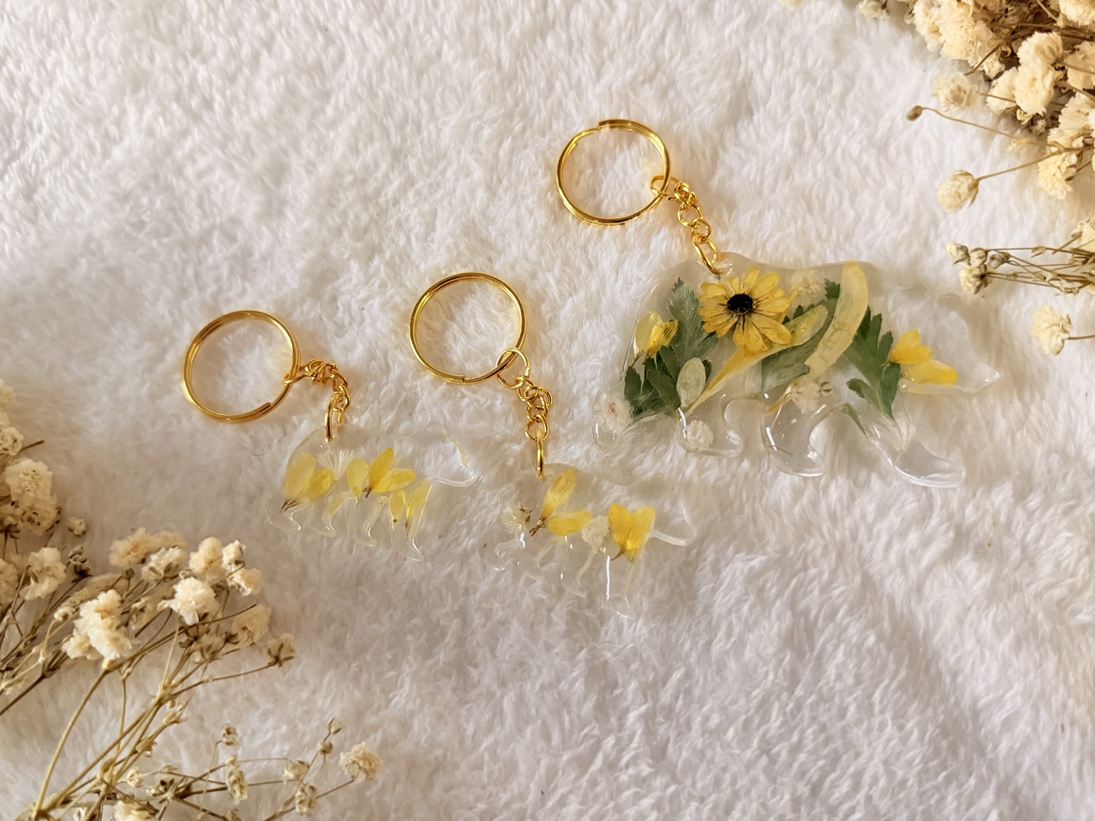 Yellow floral resin bear keychains